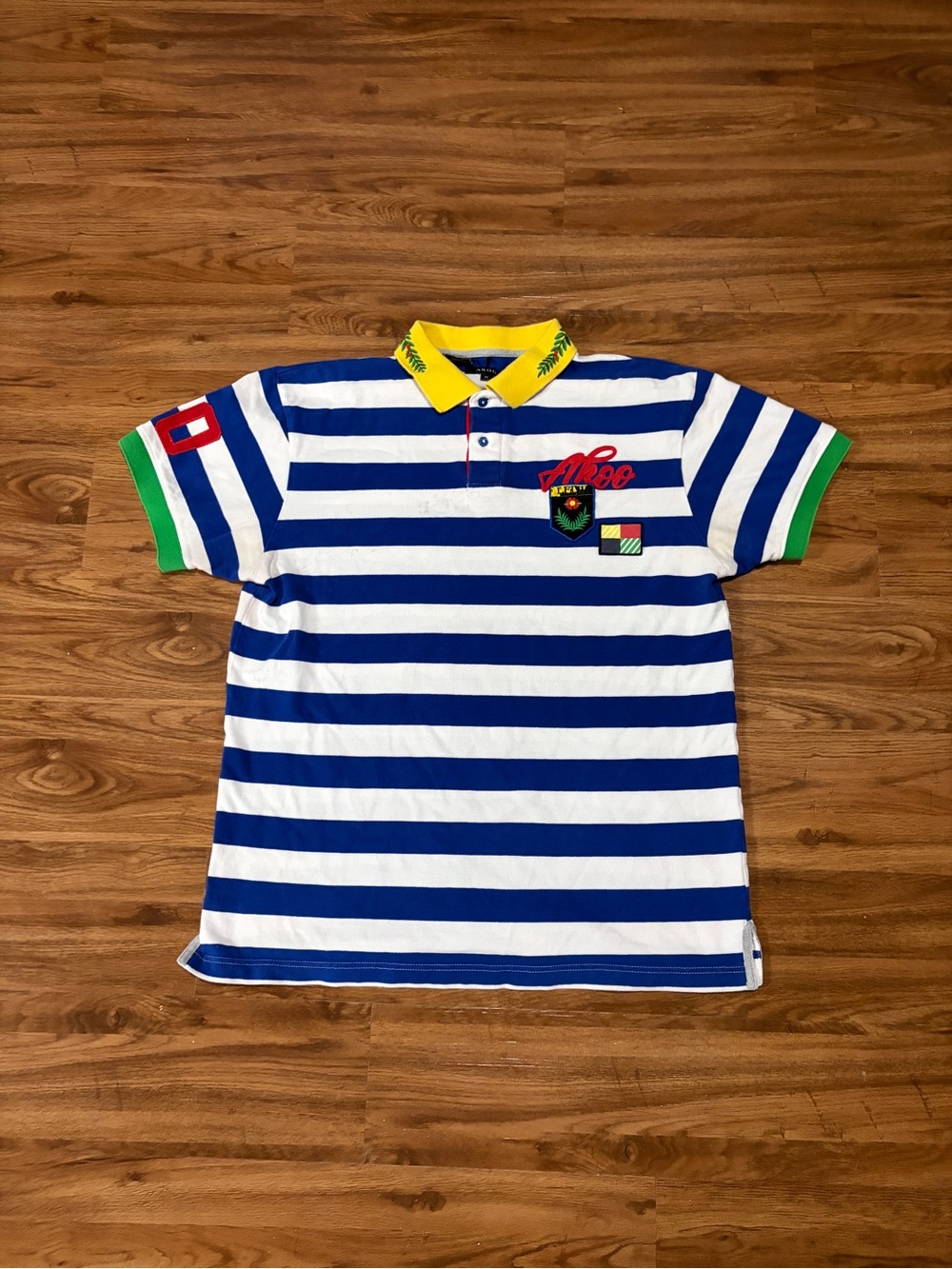 Akoo Blue & White Striped Polo with Yellow Collar